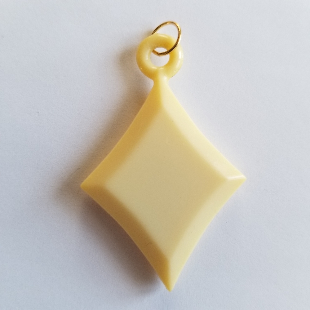 Vintage pendant diamond shaped Ivory color off white gold tone